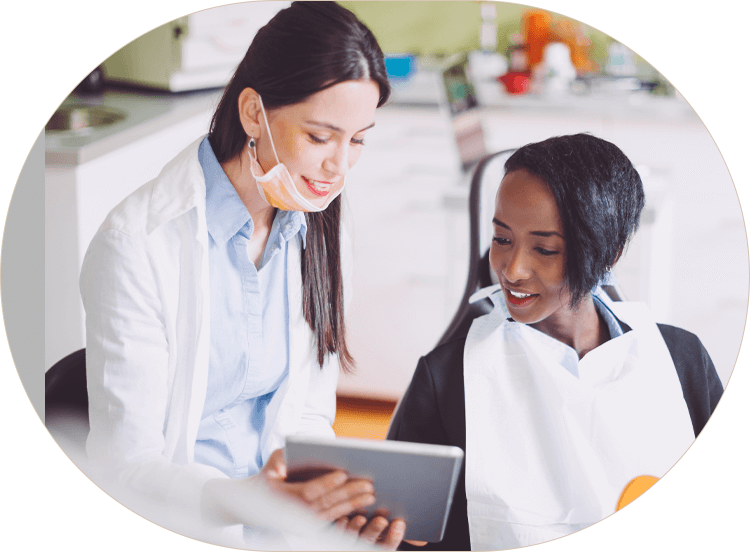 dentist speaking with a patient