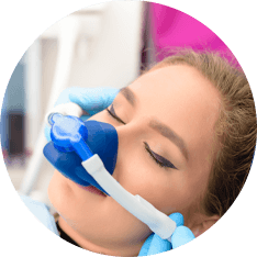 woman receiving nitrous oxide sedation